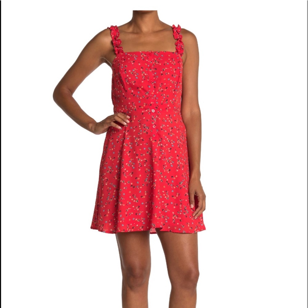 A chic floral print summer mini dress.